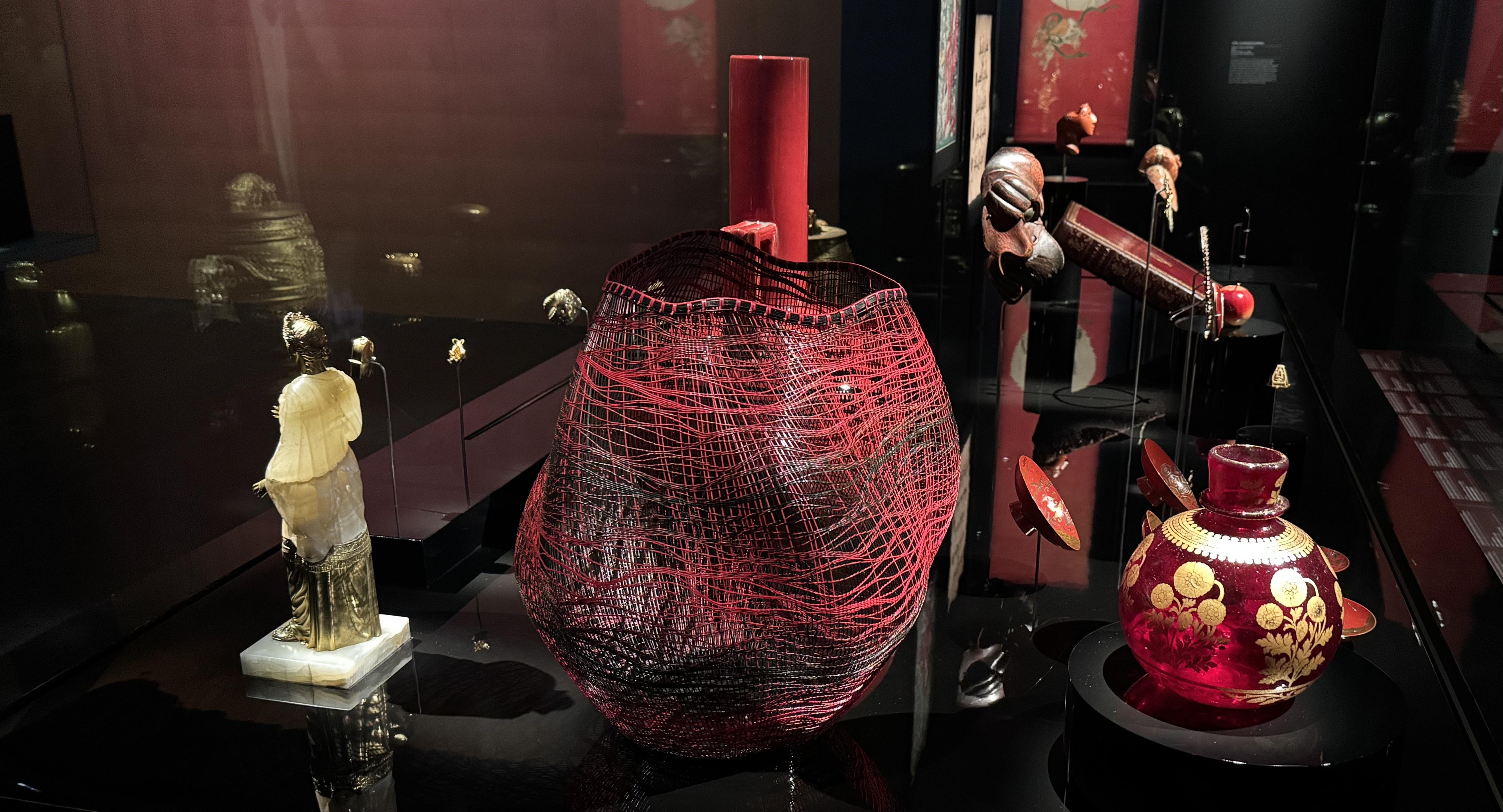 the red section, it contains a some vases and some plates along with a statue