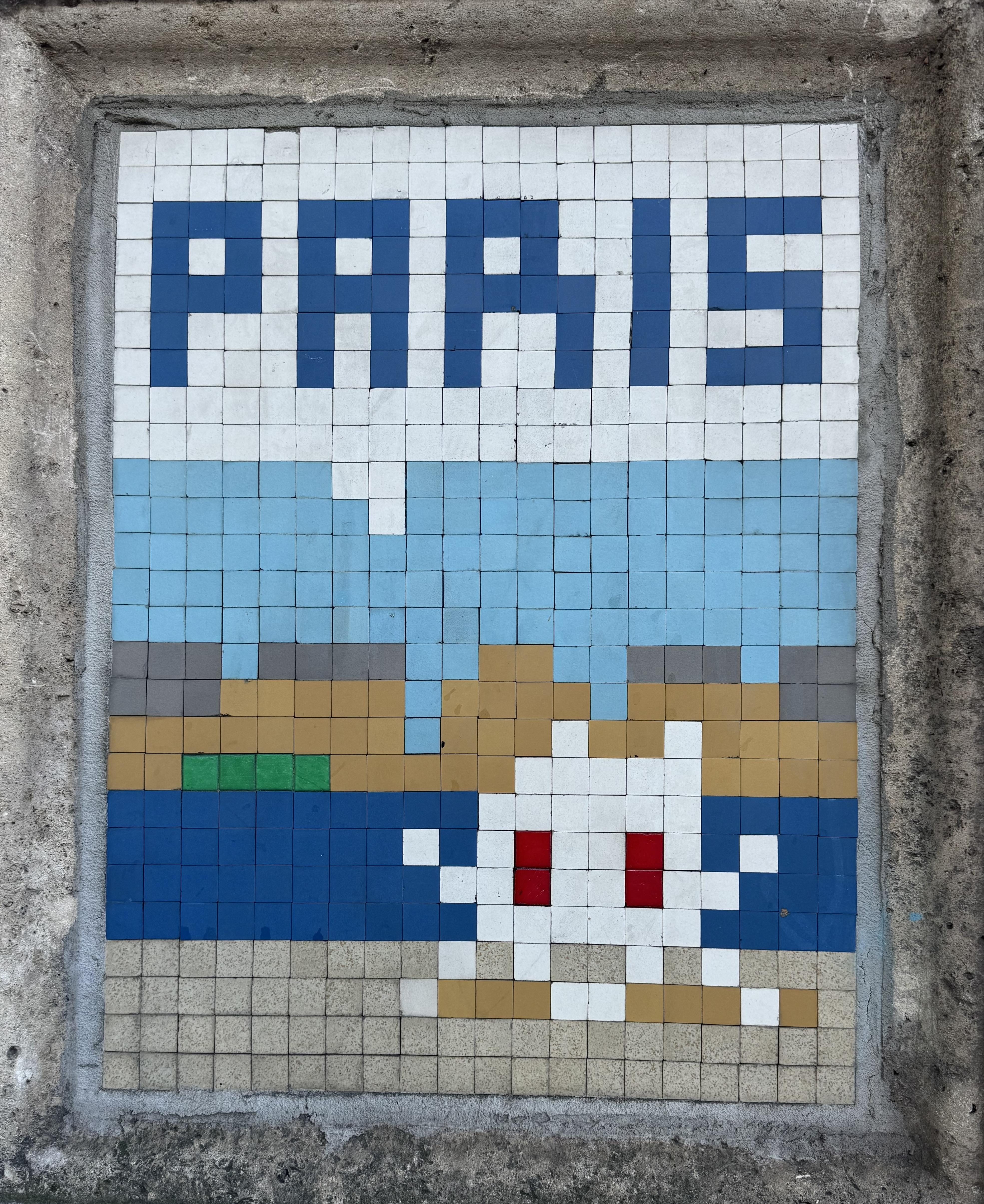 a Flash Invader mosaic. In the top third, PARIS is written in dark blue squares. At the bottom there is an invader