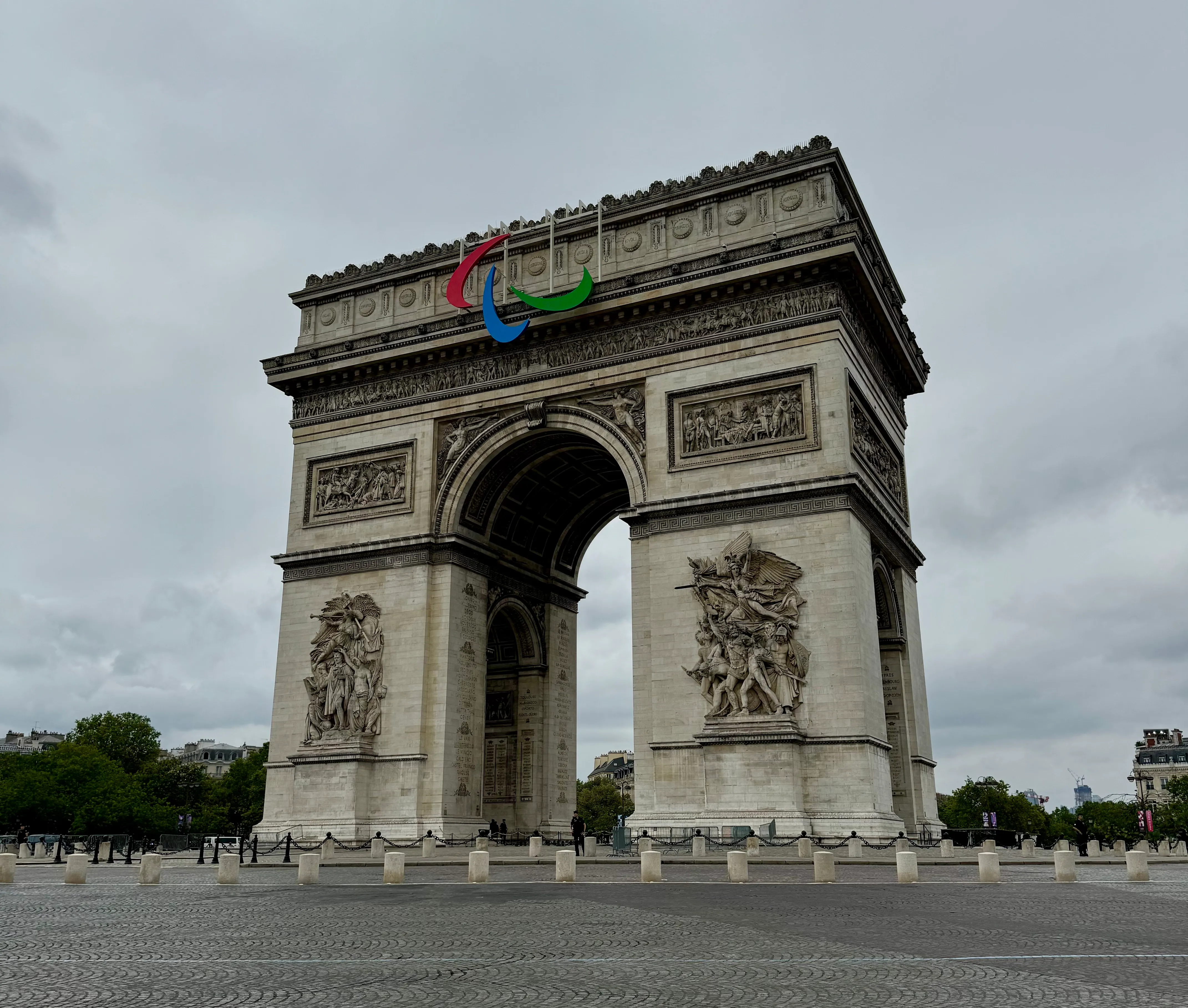 the Arc de Triomphe. It has the paralympic logo in the centre. there are no cars going around the roundabout