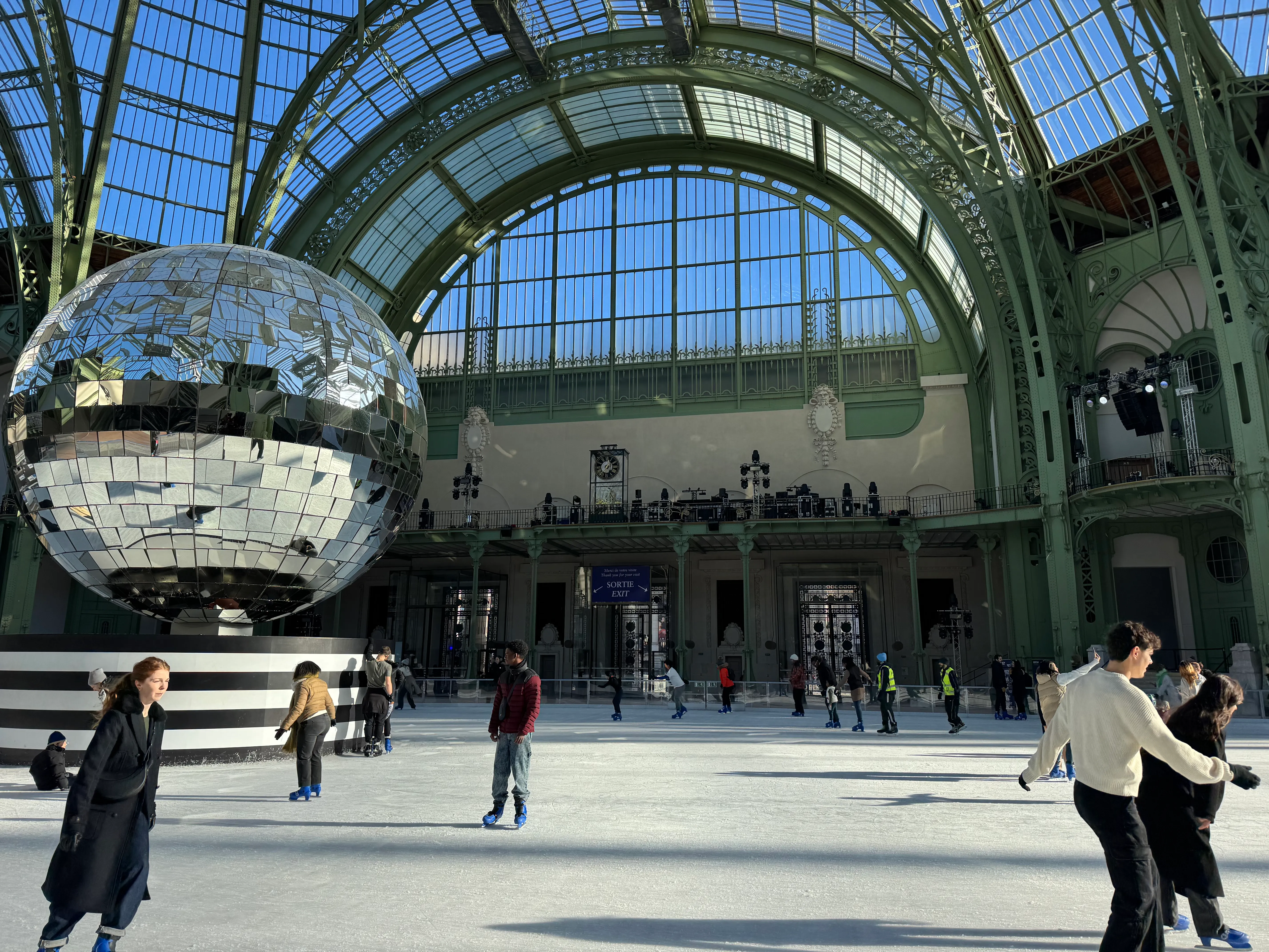 the ice skating rink, with the big disco ball on the left and you can see the glass ceiling.