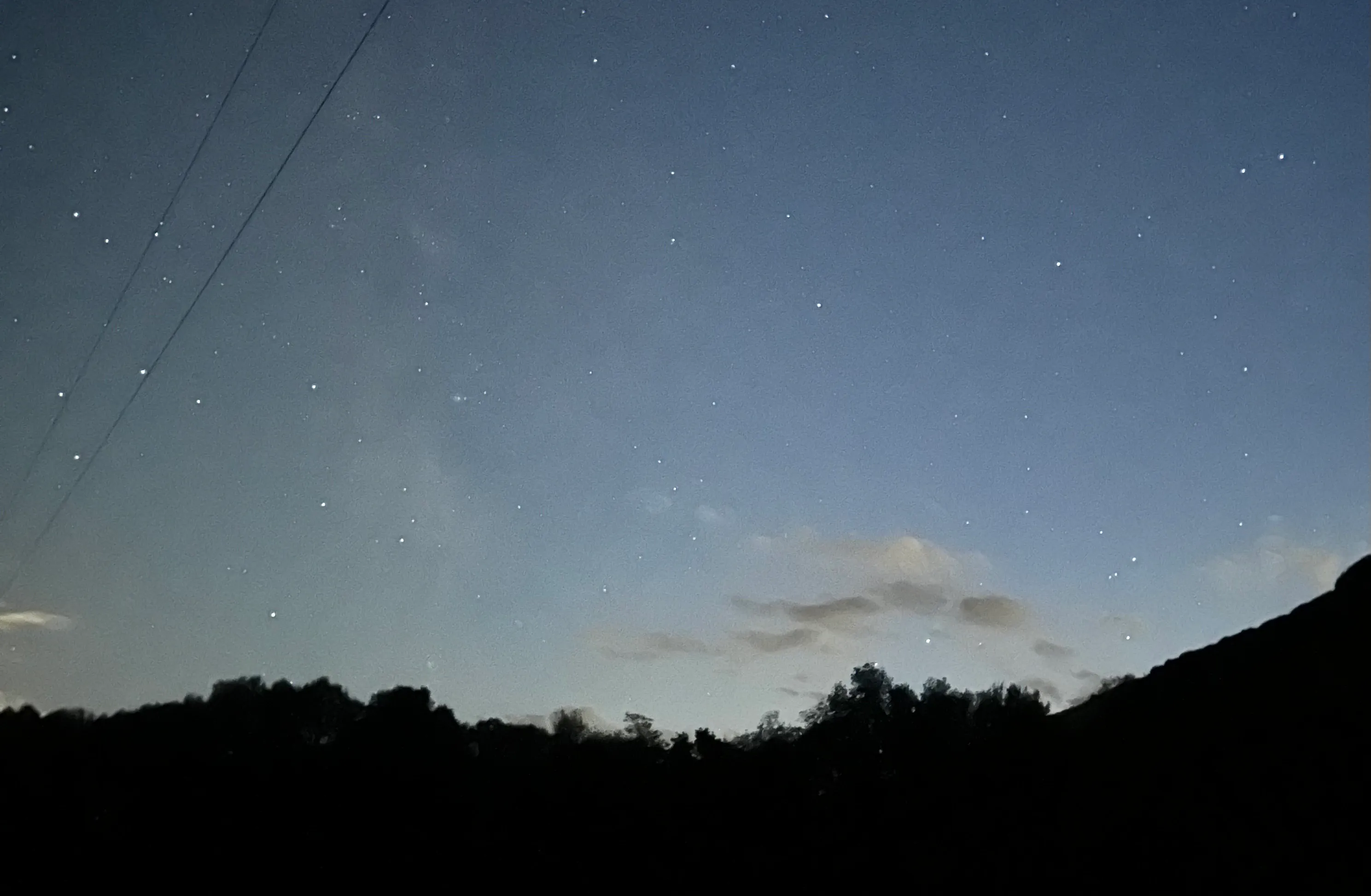 a view of the sky with lots of stars